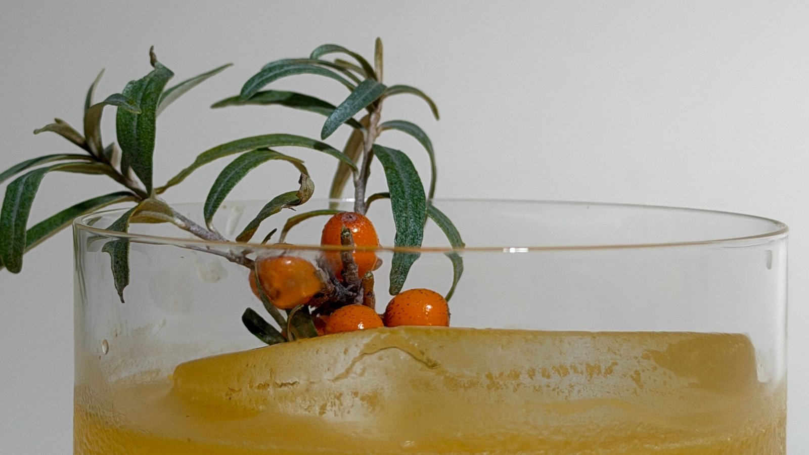 Scandinavian Apples garnished with a sea buckthorn sprig